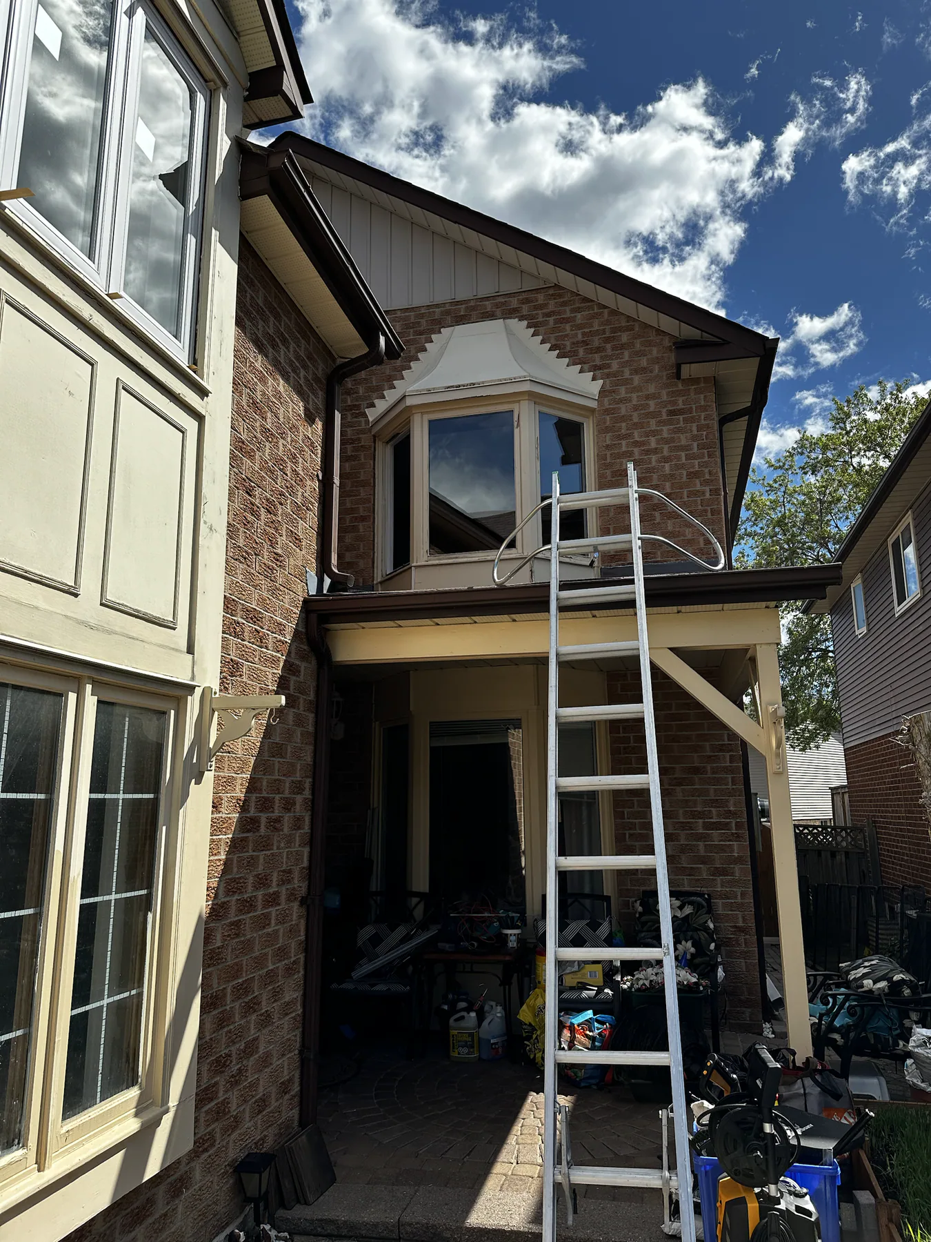 Upper-storey bay window during installation with access platform in place