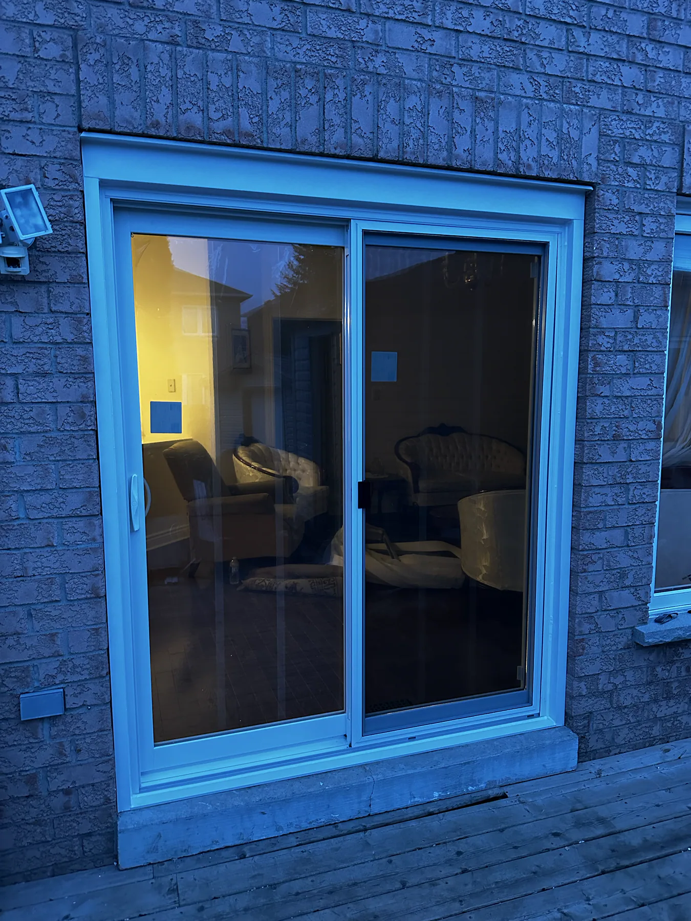 New dark sliding patio door after installation