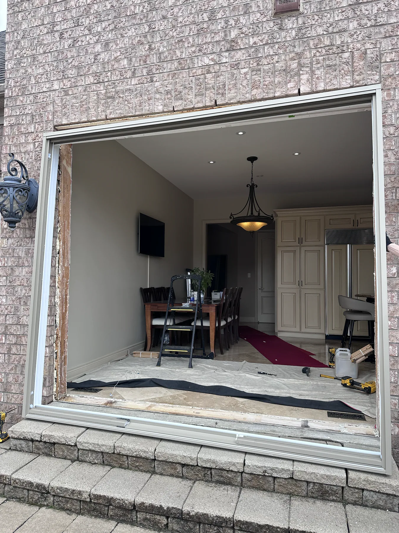 Rear wall opening prepared for a new patio door